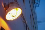 Lighting Of Warm Lamp In The Outside Of Building  With Twilight Stock Photo