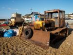 Bulldozers On Hastings Beach Stock Photo