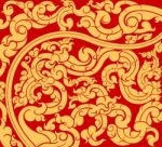 Gold Art Pattern On A Red Background Stock Photo