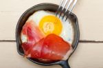 Egg Sunny Side Up With Italian Speck Ham Stock Photo