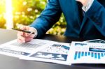 Handsome Businessman Wearing Suit And Using Modern Laptop Outdoo Stock Photo