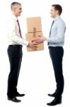 Smiling Young Men Receive Cartons Boxes Stock Photo