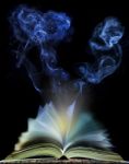 Abstract Of  Open Book Page With Moving Smoke On Black Backgroun Stock Photo