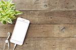 Phone Blank White Screen On Old Wood Table, Mockup Phone Rose Go Stock Photo