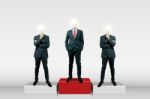 Businessmen Standing On Podium Stock Photo