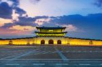 Geyongbokgung Palace And Car Light At Sunset In Seoul, South Korea Stock Photo