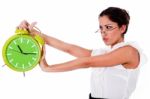 Young Woman Holding Clock Stock Photo