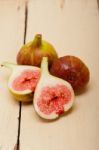 Fresh Figs On A Rustic Table Stock Photo