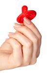 Hand Holding A Condom Stock Photo