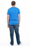 Rear View Of Casual Young Guy Posing Stock Photo