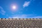 Roof And Blue Sky Stock Photo