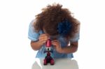 School Girl Using Microscope Stock Photo