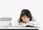 Young Student Reading Books Stock Photo