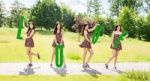 Young Smiling Girls Holding Letters With The Word Love Stock Photo