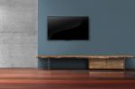 Led Tv On Concrete Wall With Wooden Furniture In Living Room Stock Photo