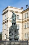 Statue Of King Charles Iv At The Entrance To The Charles Bridge Stock Photo