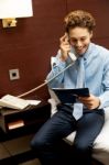 Businessman Talking Over Phone Stock Photo