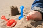 Baby On The Beach Stock Photo