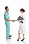 Medical Professionals Shaking Hands Stock Photo