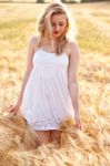 Portrait Of Beautiful Girl In Field Stock Photo