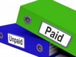 File With Paid And Unpaid Words Stock Photo