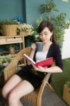 Portrait Of Thai Adult Women Office Beautiful Girl Reading Book Stock Photo