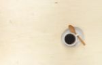 Black Coffee With Wooden Spoon Stock Photo