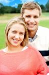 Smiling Young Couple In Outdoor Stock Photo