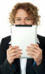 Woman Behind Ipad Stock Photo