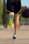 Handsome Young Man Running In The Park Stock Photo