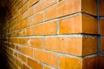 Orange-Brown Brick Wall Stock Photo