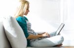 Pretty Young Woman Working With Laptop At Home Stock Photo