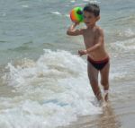 Boy On The Beach Stock Photo