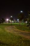 Night Public Park In The City With Houses Near Stock Photo