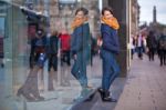 Pretty Young Girl Standing At Shopfront Stock Photo