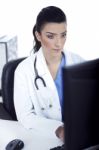 Young Doctor Working In The Computer Stock Photo