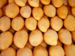 Stacking Yellow Mangoes Stock Photo