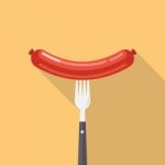 Sausage On A Fork Stock Photo