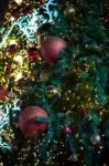 Glitter Red Ball Celebrate Christmas On Tree With Wire White Light Vignette Background Stock Photo