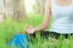 Close Up Woman Was Meditation Yoga In Park Stock Photo