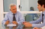 Business People At Meeting Stock Photo