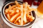 Fresh French Fries On A Bucket Stock Photo