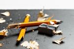 Broken Pencil With Metal Sharpener And Shavings Stock Photo