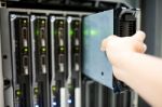 Man Fix Server Network In Data Center Room Stock Photo