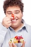 Chubby Man With Fresh Salad Stock Photo