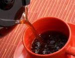 Pouring A Cup Of Coffee Stock Photo