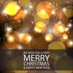 Merry Christmas And Happy New Year Gold Bokeh Background Stock Photo