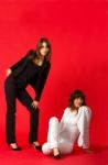 Young Sisters Twins Posing In Studio Stock Photo