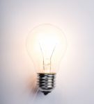 Light Bulb With Drawing Graph Stock Photo