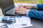 Handsome Businessman Wearing Suit And Using Modern Laptop Outdoo Stock Photo